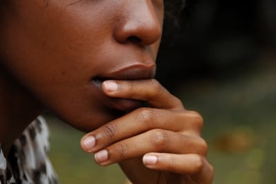 Image of african american woman thinking