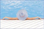 Woman Relaxing by the Pool - Pamper Yourself