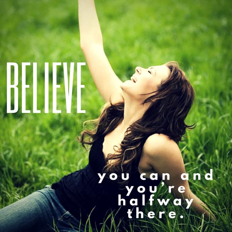 Woman sitting in a Grassy Field - Believe You Can Achieve