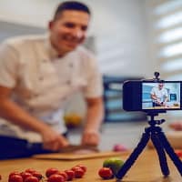 Man Filming Himself for His YouTube Channel