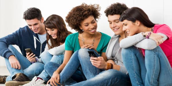 A Group Looking at Mobile Friendly Website on a Cell Phone