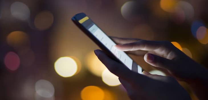 A Woman Using a Smartphone