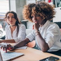 Two Young Women of Creative Team