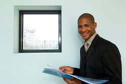 Young Man Reading College Award letter