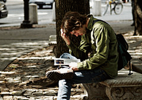 Young-man-thinking-about-college