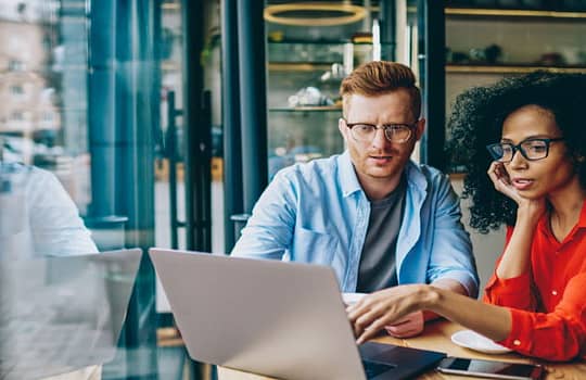 Two Owners Meet to discuss Business Website Changes