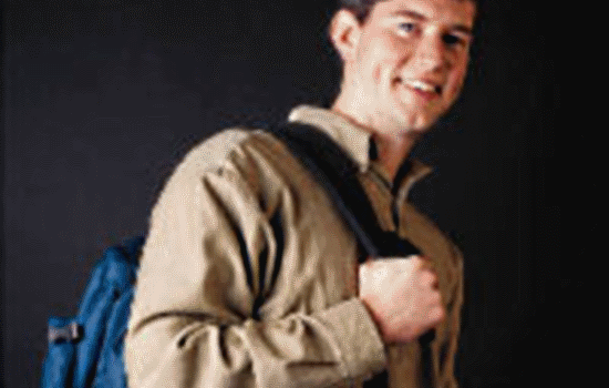 Student Standing Holding Backpack