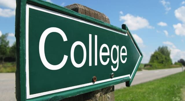 College Signpost Along a Rural Road