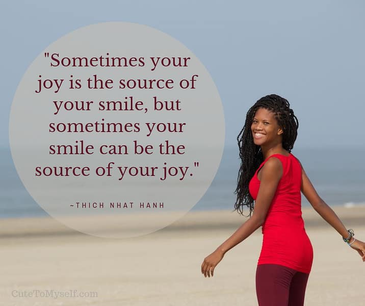 Inspirational quote attributed to Thich Nhat Hanh reading “Sometimes your joy is the source of your smile, but sometimes your smile can be the source of your joy” beside a smiling woman on a beach.