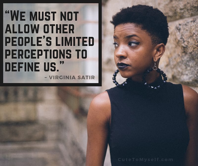 Black Woman Wearing Black Top Looking To the Right