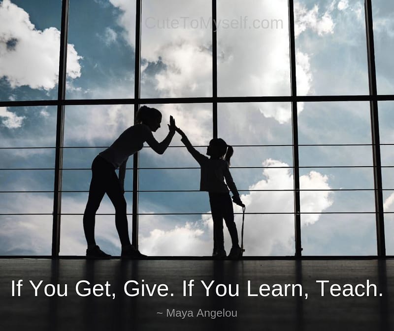 Woman giving child High Five